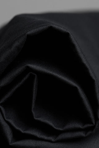 Buy Atelier Brunette Oxford Cotton Fabric in Black from our trusted UK online fabric shop