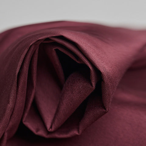 Atelier Brunette Oxford Cotton Fabric in Crispy Brown, a deep burgundy colour