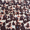 Hokkoh Aster Floral Cotton Fabric in Warm Brown