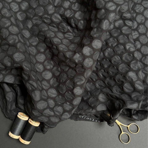 Buy Kokka Small Dots Textured Cotton Fabric in Black from our trusted UK online fabric shop