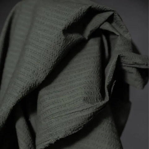 Buy Merchant and Mills Aspen Seersucker Stripe Organic Cotton Fabric in Green from our trusted UK online fabric shop